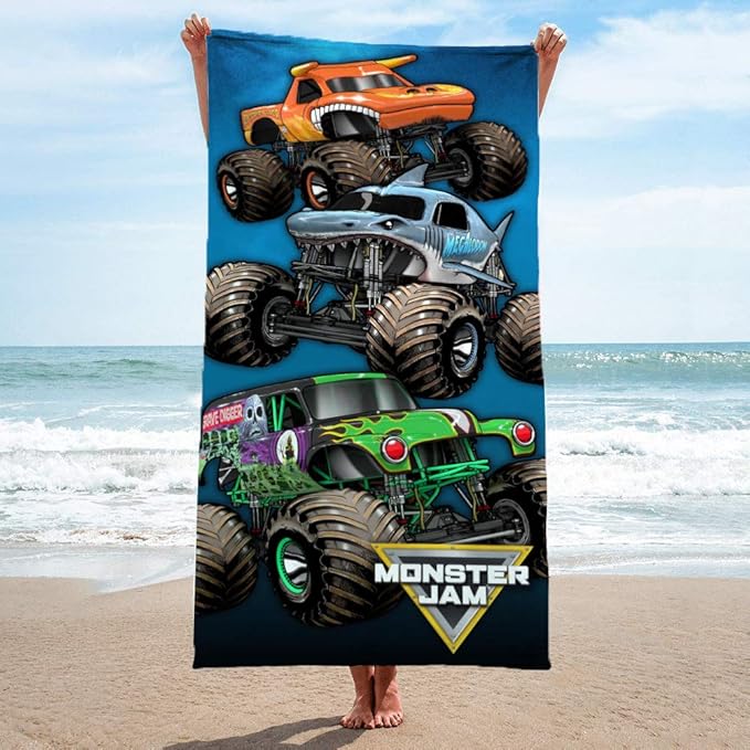 Jay Franco Monster Jam Team Up Kids Bath/Pool/Beach Towel - Features Grave Digger & Megalodon - Super Soft & Absorbent Cotton Towel, Measures 28 x 58 inches (Official Monster Jam Product)