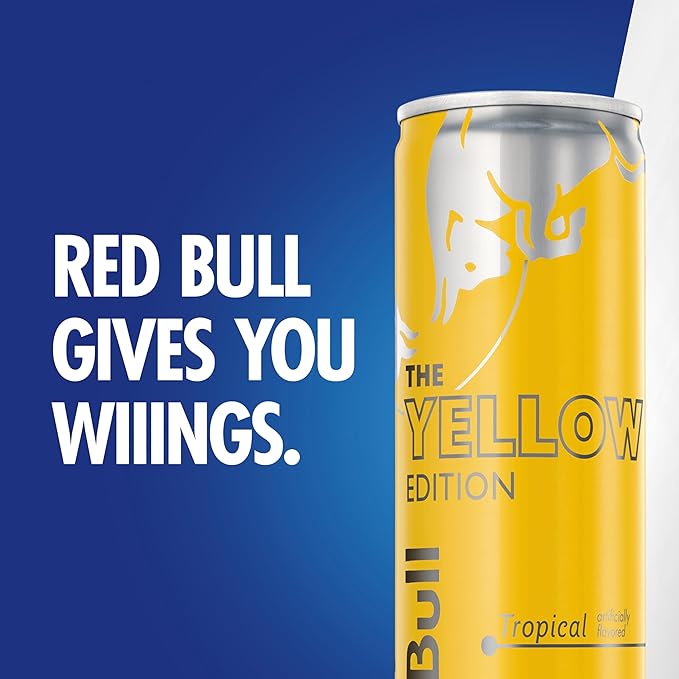 Red Bull Yellow Edition Energy Drink, Tropical, with 80mg Caffeine plus Taurine & B Vitamins, 8.4 Fl Oz, 6 Packs of 4 Cans (Pack of 24)